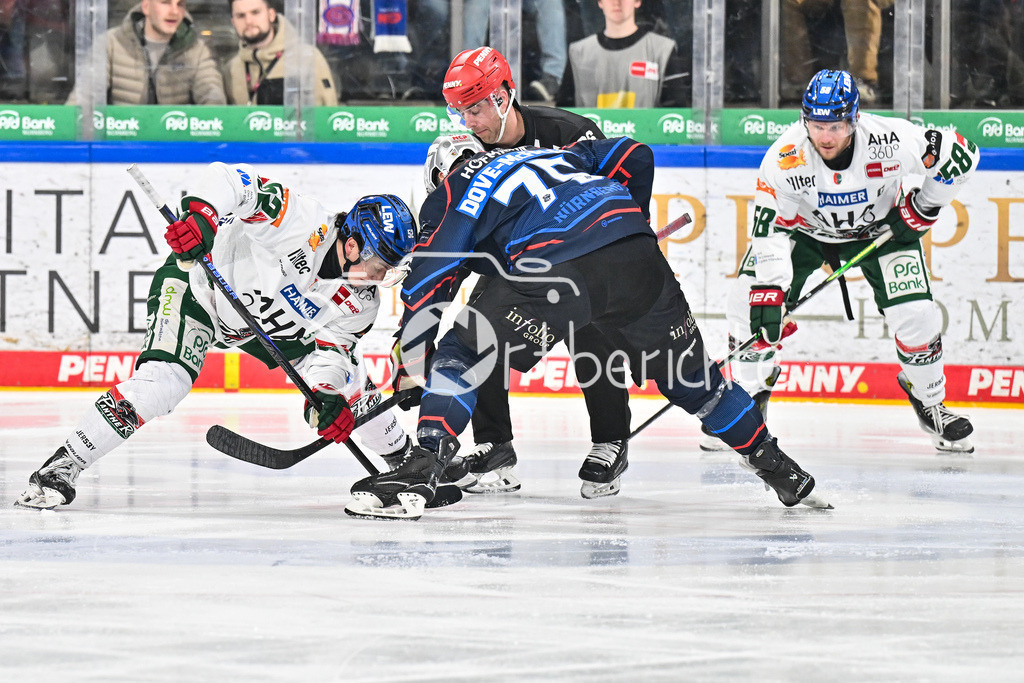 Nürnberg Ice Tigers - Augsburger Panther | NUREMBERG, GERMANY - 23. JANUARY: beim Bully Enrico HENRIQUEZ (Augsburger Panther 52) und Samuel Dove-McFALLS (Nürnberg Ice Tigers 75) während dem Match zwischen den Nürnberg Ice Tigers und den Augsburger Panthern am 42. Spieltag der Penny DEL in der PSD Bank Nürnberg Arena