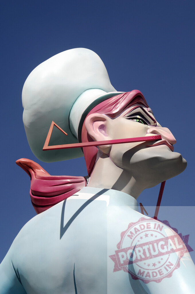 Fallas festival chef cook caricature sculpture in Valencia Spain | Exaggerated chef sculpture wearing a tall hat during the traditional Fallas festival - Realized with Pictrs.com