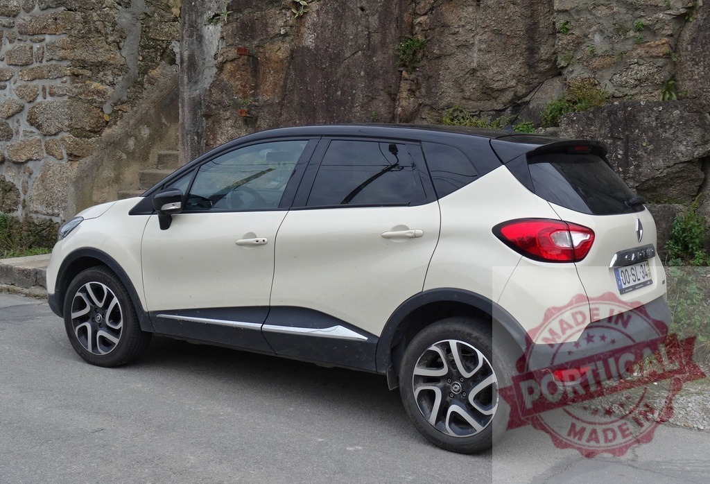 Renault Captur crossover parked on Portugal street | White Renault Captur parked alongside a traditional stone wall in Portugal - Realized with Pictrs.com