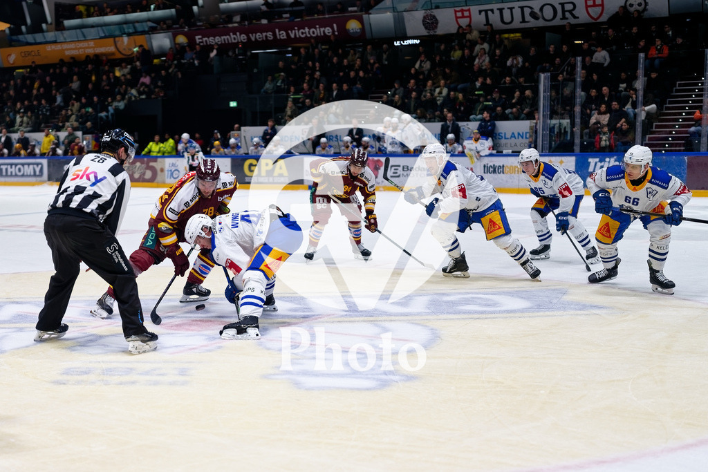 National League - Geneve-Servette HC v EV Zug | Marc-Antoine Pouliot (78 Geneve-Servette HC) in action (close up) battle for the puck (duel) Andreas Wingerli (40 EV Zug)  during the National League match between Geneve-Servette HC and EV Zug at Les Vernets in Geneva, Switzerland
