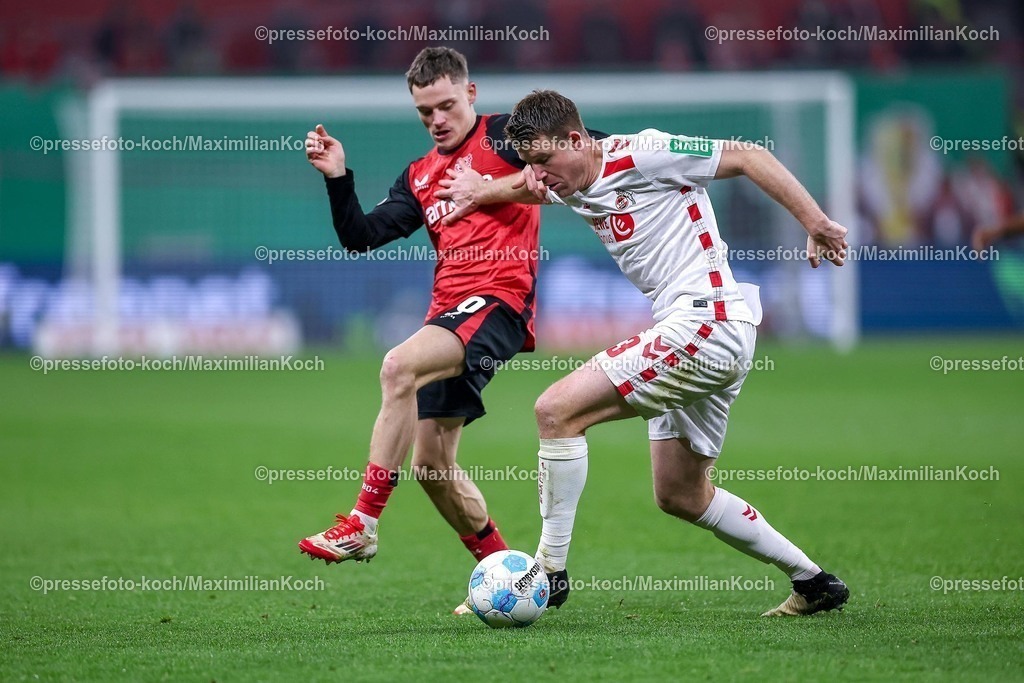 DFB05022502250 | 05.02.2025, Fußball, DFB-Pokal Viertelfinale, Bayer 04 Leverkusen - 1.FC Köln, BayArena, Saison 2024 2025: Florian Wirtz (Bayer04 Leverkusen #10) im Zweikampf gegen Dominique Heintz (FC Köln #3)DFB regulations prohibit any use of photographs as image sequences and or quasi-video.