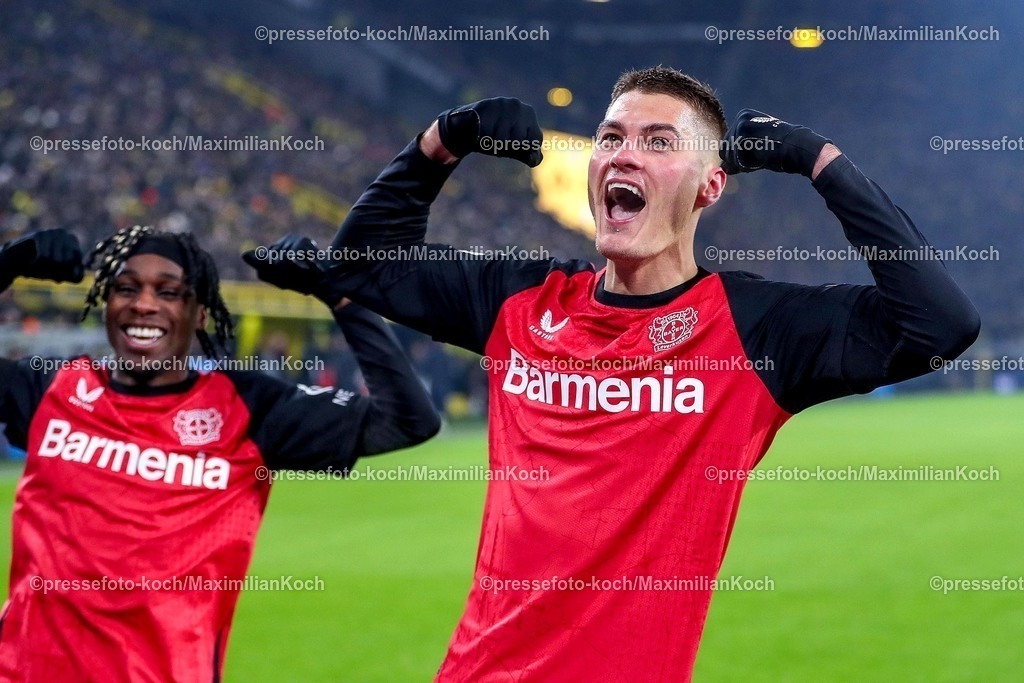 BVB10012502257 | 10.01.2025, Fußball, Borussia Dortmund - Bayer 04 Leverkusen, 1. Fußball Bundesliga, 16. Spieltag, Signal Iduna Park, Saison 2024 2025: Torjubel nach dem treffer zum 2:0 durch Torschütze Patrik Schick (Bayer04 Leverkusen #14) zusammen mit Jeremie Frimpong (Bayer04 Leverkusen #30)DFB regulations prohibit any use of photographs as image sequences and or quasi-video.