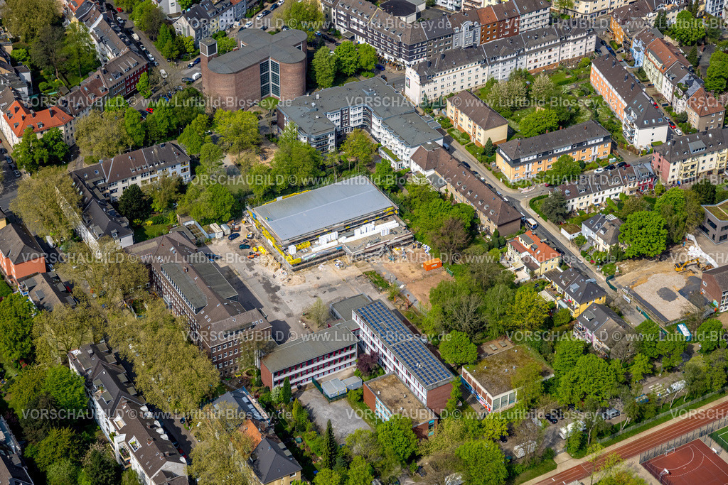 Essen240400911 | Luftbild, Maria-Wächtler-Gymnasium und Baustelle mit Neubau der Sporthalle, kath. Kirche St. Andreas, St. Andreas Quartier Seniorenheim im Wohngebiet Paulinenstraße, Rüttenscheid, Essen, Ruhrgebiet, Nordrhein-Westfalen, Deutschland