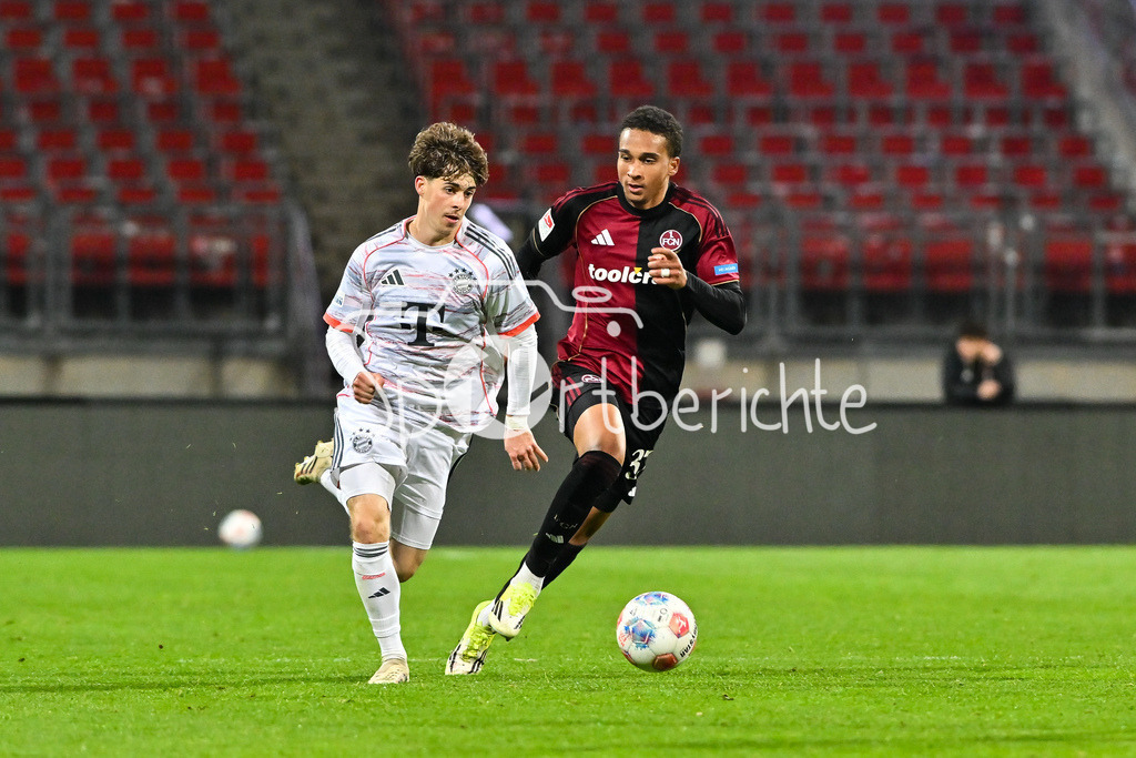 1. FC Nürnberg II - FC Bayern Amateure | NÜRNBERG, GERMANY - 21. APRIL: im Duell Maximilian SCHUHBAUER (FC Bayern München II 15) und Noah MABOULOU (1. FC Nürnberg II 37) während dem Match zwischen dem 1. FC Nürnberg II und den Amateuren des FC Bayern am 30. Spieltag der Regionalliga Bayern im Max-Morlock Stadion
