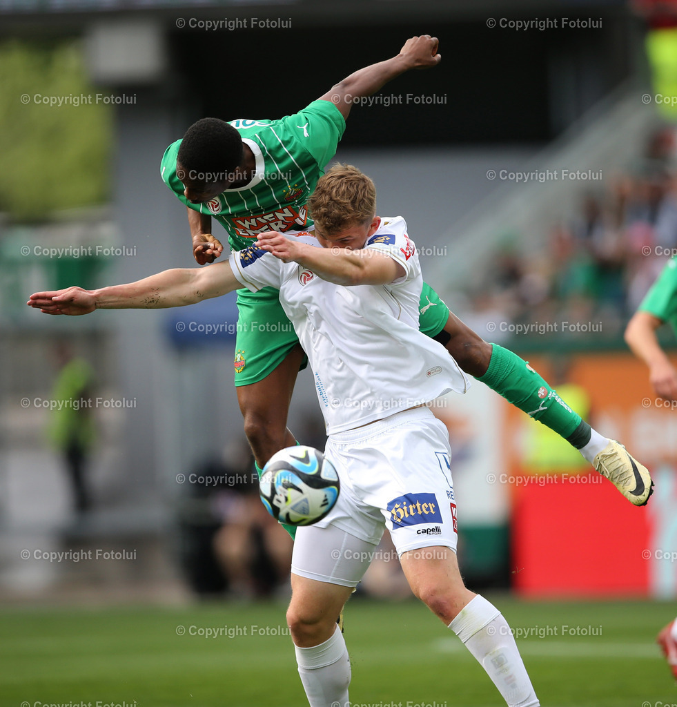 A_LUI_14042024_06 | SPORT,FUSSBALL.ADMIRAL BUNDESLIGA SK RAPID-AUSTRIA KLAGENFURT14.04.2024 IM BILD: TERENCE KONGOLO (RAPID)  UND NICOLAS BINDER  (KLAGENFURT) FOTO.FOTOLUI/MW