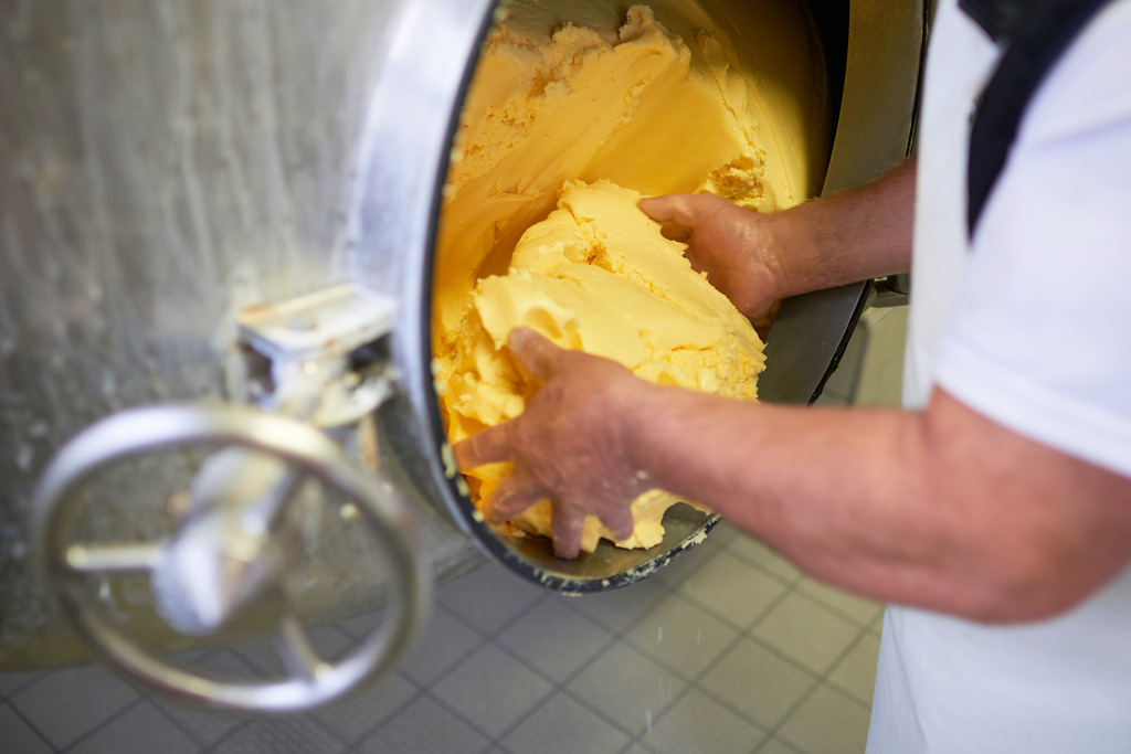 Sennerei Hittisau | Hittisau, Austria - July 29, 2019: Sennerei Hittisau; frische Butter in einem Kolding Biconical Mixer. - Realisiert mit Pictrs.com