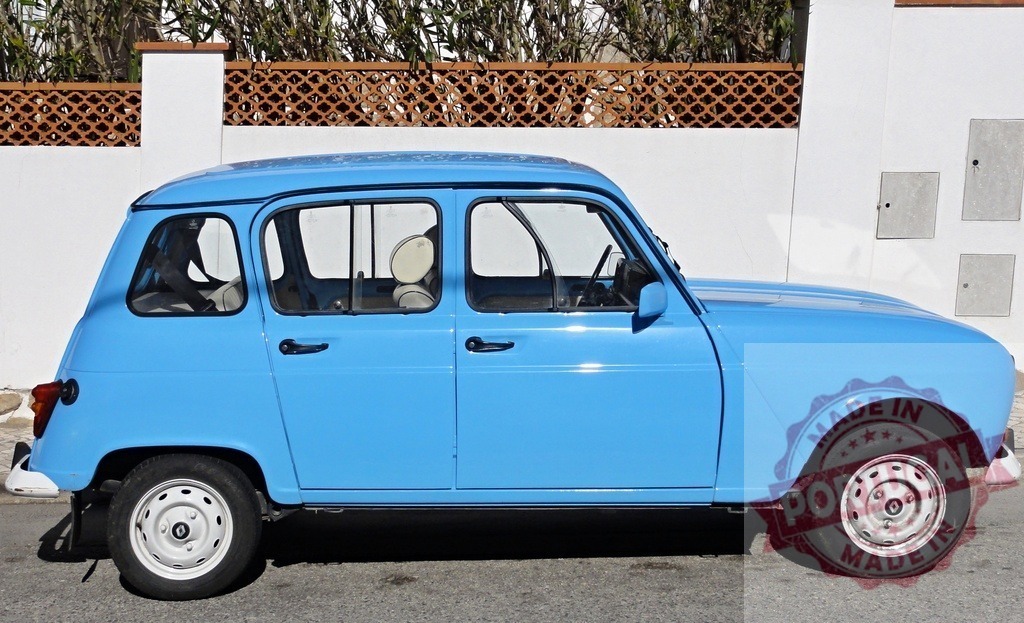 Classic Renault 4 parked in the street in a sunny day | Light blue Renault 4 parked near a white wall with a brown fence - Realized with Pictrs.com
