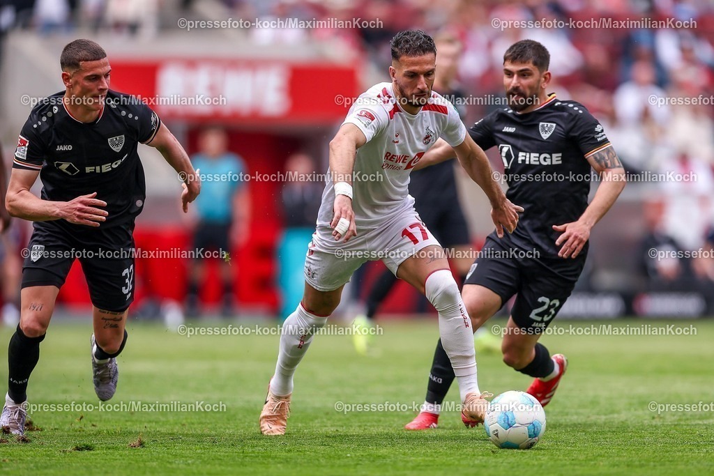 1FC20042501140 | 20.04.2025, Fußball, 1. FC Köln - Preußen Münster, 2.. Fußball Bundesliga, 30. Spieltag, RheinEnergie-STADION, Saison 2024 2025: Leart Pacarada (FC Koeln #17) im Zweikampf gegen Luca Bazzoli (Preussen Muenster #32) und Malik Batmaz (Preussen Muenster #23) DFB regulations prohibit any use of photographs as image sequences and or quasi-video.