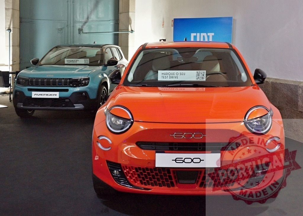 Fiat 600e and Jeep Avenger at car exhibition | New electric vehicles showcasing modern automotive design and sustainable transportation - Realized with Pictrs.com