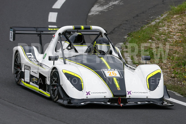 Rechberg Hill Climb 2025 – FIA European Hill Climb Championship | Rechberg Hill Climb 2025, part of the FIA European Hill Climb Championship. High-speed racing action, mountain scenery, atmosphere and pure motorsport passion captured in detail. The image shows Juergen FROMMKNECHT (GER) Radical SR3 RSX Suzuki.          