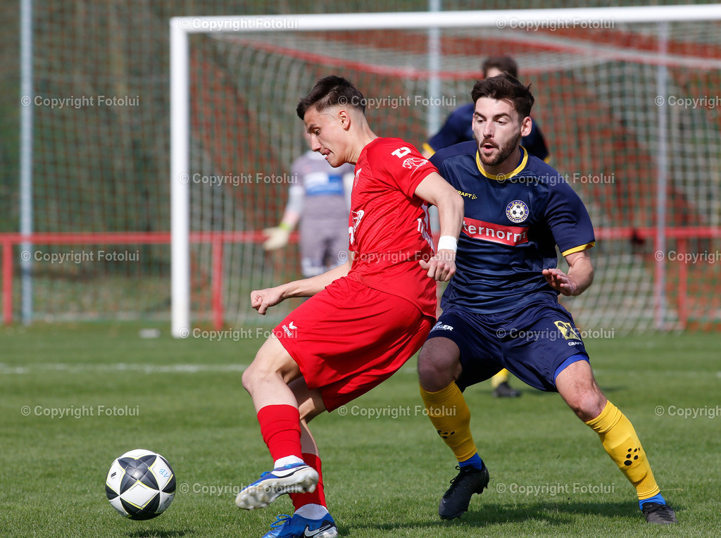 A_LUI_05052025_05 | SPORT,FUSSBALL LL.OST 05.04.2025 IM BILD:VELJKO RAKIC  (OEDT1B)- JULIAN AIGLSDORFER (PUTZLEINSDORF) FOTO:  FOTOLUI