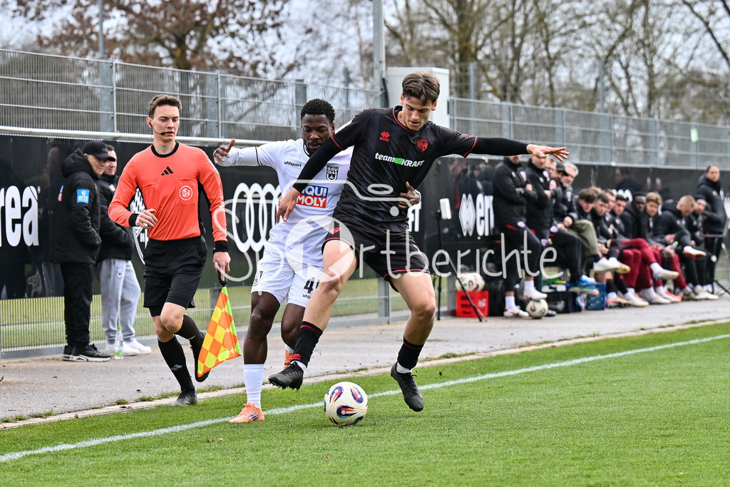 FC Ingolstadt - SSV Ulm 1846 Fussball  | INGOLSTADT, GERMANY - 25. MAERZ: im Duell Streli MAMBA (SSV Ulm 45) und Tomislav BAGARIC (FC Ingolstadt 49) während dem Testspiel zwischen dem FC Ingolstadt und dem SSV Ulm 1846 Fussball auf Platz 4 am Audi Sportpark