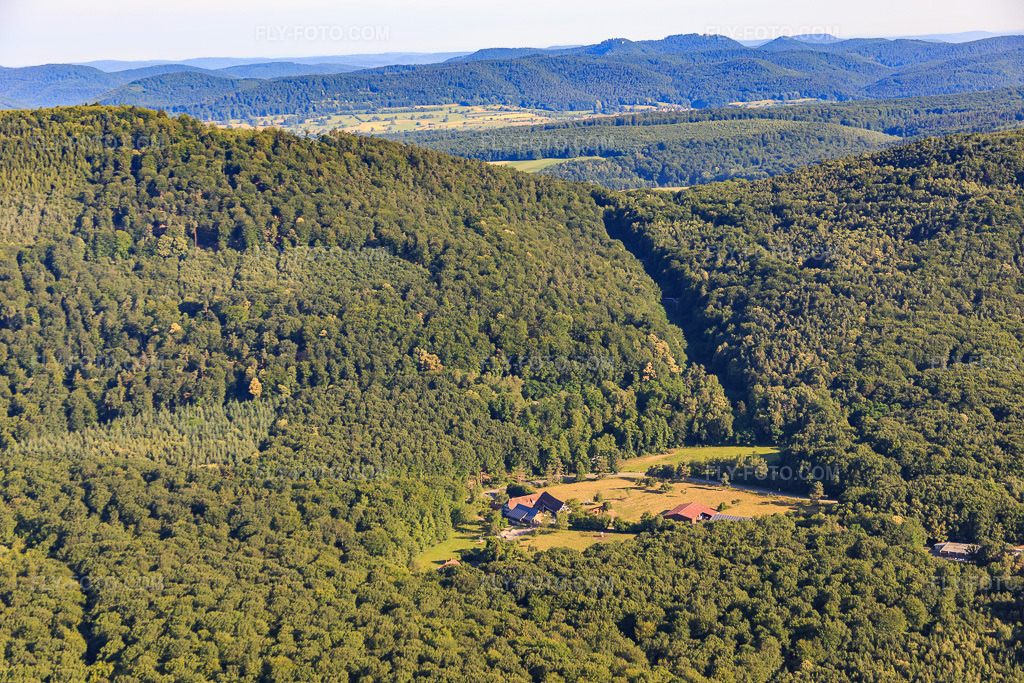 Aerial view: Ferme Auberge du Moulin des Sept Fontaines in Drachenbronn-Birlenbach in the state Bas-Rhin, France. – Photo: IMG_082976.jpg taken on 06/26/2015 by Werner Riehm/FLY-FOTO.com – Resolution of the original: 5472 x 3648 px – WWW.AUBERGE7FONTAINES.COM