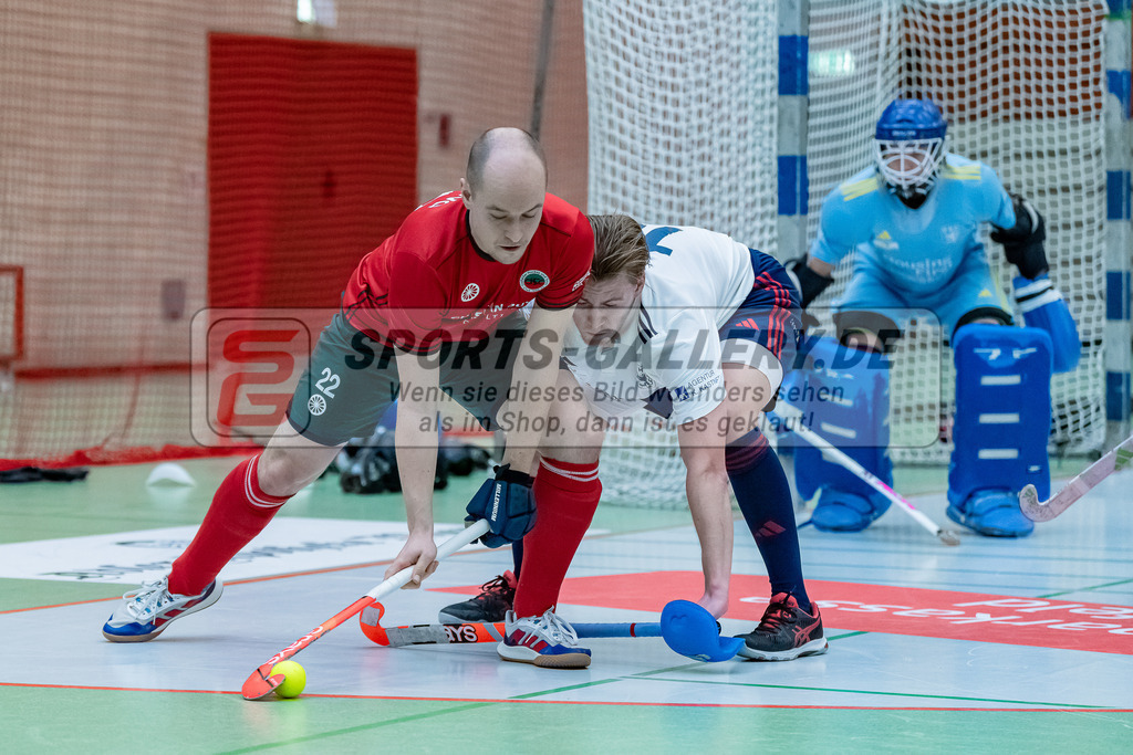 HK_20231217_107576 | 1. Bundesliga Herren Crefelder HC - Düsseldorfer HC  am 17.12.2023 Sporthalle Glockenspitz, Krefeld , Ehling Jonathan ( Crefelder HTC #22 ) , Tassilo Busch ( Düsseldorfer HC #10 )
