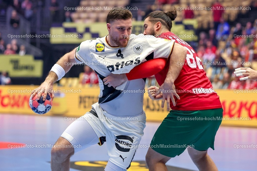 EHF22012601021 | 22.01.2026, Handball, Men's EHF EURO 2026, Deutschland - Portugal, Jyske Bank Boxen in Herning, Dänemark, Main Round:  Johannes Golla (Germany #04) im Zweikampf gegen   Luis Diogo Sousa Frade (Portugal #82) 