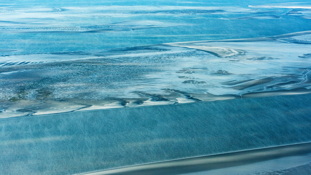 dr__0013305_1.jpg | SANKT PETER-ORDING 07.08.2017 Wattenmeer der Nordsee- Küste in Sankt Peter-Ording im Bundesland Schleswig-Holstein, Deutschland. // Wadden Sea of North Sea Coast in Sankt Peter-Ording in the state Schleswig-Holstein, Germany. Foto: Daniel Reiter
