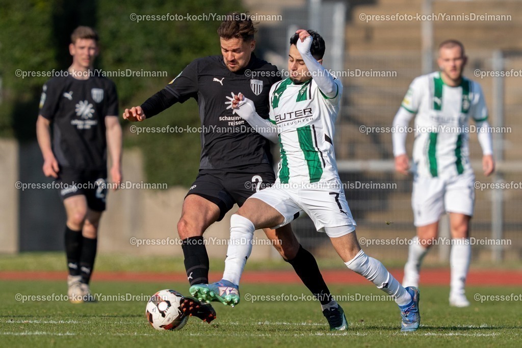 xYDR15032501101 | 15.03.2025, xydrx, Fußball, Borussia Mönchengladbach II (U23) - 1.FC Bocholt, Regionalliga West, Grenzlandstadion: Julian Riedel (1. FC Bocholt #2) im Zweikampf gegen  Ismail Harnafi (Borussia Moenchengladbach II #7)