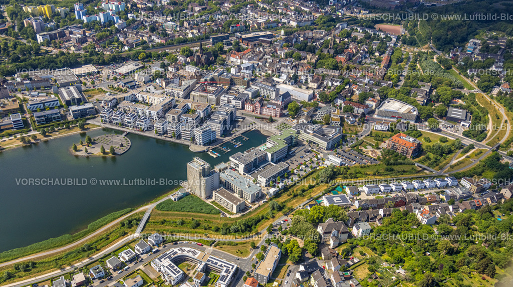 Dortmund220704706 | Luftbild, Phoenix-See, Hafen, hinten links kath. Kirche St. Clara, rechts evang. Lutherkirche, Baustelle für den Neubau der Comunita Residenz Phoenix See, Seniorenwohnheim Hochhaus H12, Hörde, Dortmund, Ruhrgebiet, Nordrhein-Westfalen, Deutschland