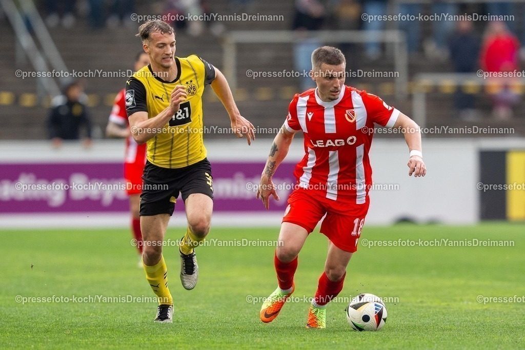 xydr13042501098 | 13.04.2025, xydrx, Fußball, Borussia Dortmund II - FC Energie Cottbus, 3.Liga, Stadion Rote Erde, Saison 2024 2025: Erik Engelhardt (FC Energie Cottbus #18) Yannik Luehrs (Borussia Dortmund II #34) DFB regulations prohibit any use of photographs as image sequences and or quasi-video.