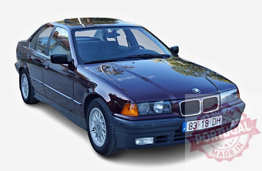 BMW E36 sedan isolated on white background | Iconic BMW E36 sedan reflecting light, showing design and style - Realized with Pictrs.com