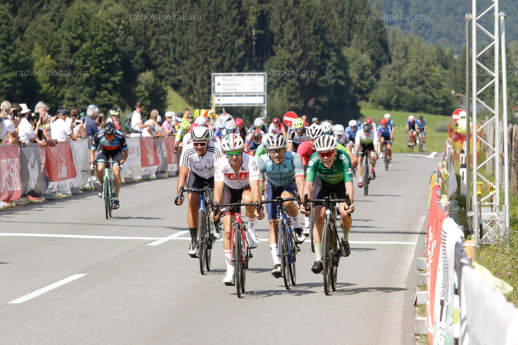 1078_20230817_Bewerb_Maenner_Muehlanger | AUT - OESTERREICH, 2023-08-16: SPORT RENNRAD-FAHREN - 55. INTERNATIONALER RADWELTPOKAL IN ST. JOHANN IN TIROL  - Vintage-Radrennen mit WM-Bronze-Medaillen-Siegerin Christina Schweinberger, den Teilnehmer und Alexander Baumann (vom Orginastions-Team) - TAG 2 BEWERB MAENNER IN SECHS GRUPPEN  ; Foto: Roland Muehlanger