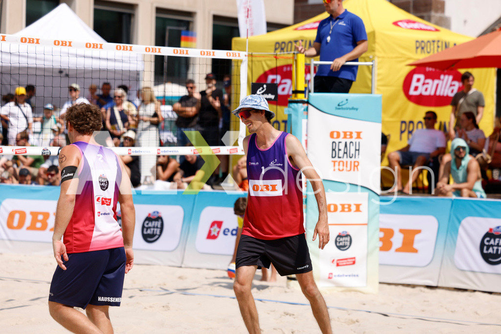 Obi BeachTour 2026 - Basel | BASEL, SWITZERLAND - JULY 19: SIMON HAGENBUCH (SUI) and YVES HAUSSENER (SUI) during the Obi BeachTour 2026 match between HAGENBUCH / HAUSSENER (SUI) and LEITNER / KINDL (AUT) at Barfüsserplatz on July 19, 2026 in Basel, Switzerland. - Realisiert mit Pictrs.com