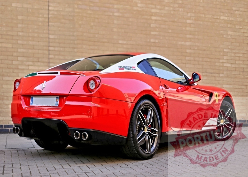 Red Ferrari 599 GTB Fiorano Scuderia showcasing its elegance and power | Parked Ferrari 599 GTB Fiorano Scuderia exuding luxury and performance against a brick wall - Realisiert mit Pictrs.com