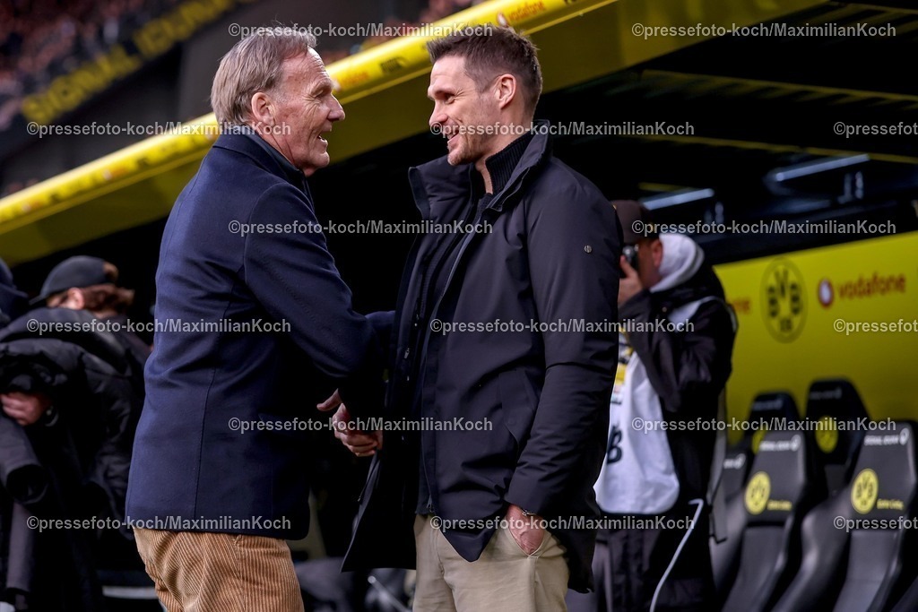 BVB21032602087 | 21.03.2026, Fußball, Borussia Dortmund - Hamburger SV, 1. Fußball Bundesliga, 27. Spieltag, Signal Iduna Park, Saison 2025 2026: Sportdirektor Sebastian Kehl (BVB #sk) zusammen mit neben Präsident Hans-Joachim Watzke (BVB #jw)  DFB regulations prohibit any use of photographs as image sequences and or quasi-video.