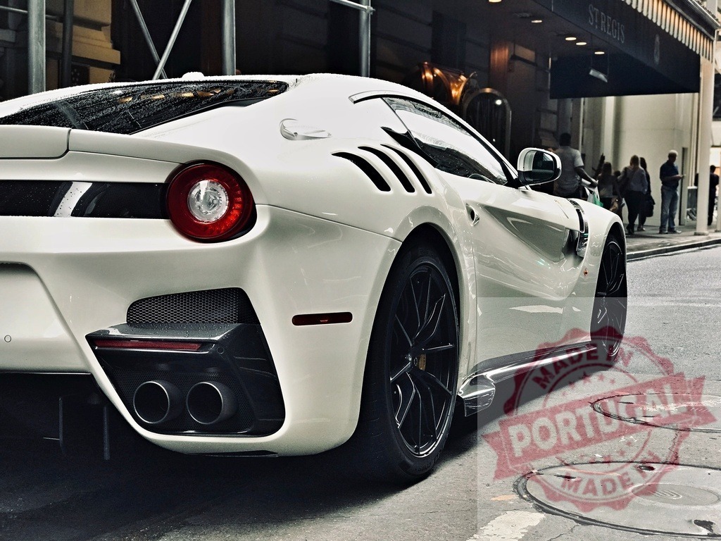 Ferrari F12tdf luxury supercar parked on city street | Ferrari F12tdf luxury supercar showcasing performance and prestige on a sophisticated street - Realisiert mit Pictrs.com