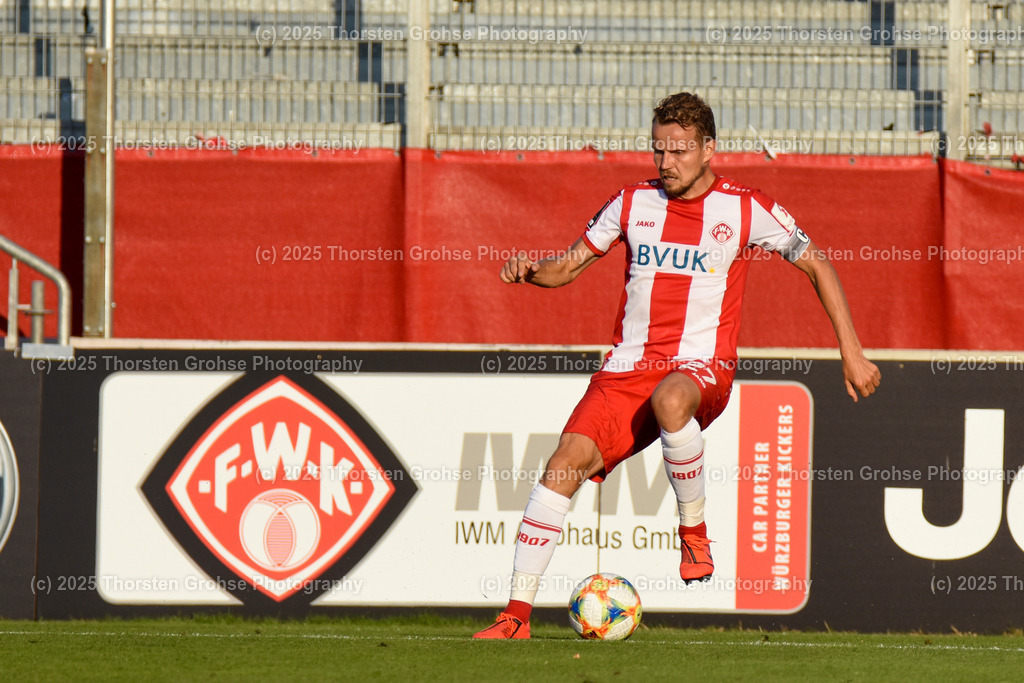 Fussball, 3. Liga, Wuerzburg Kickers vs. SG Sonnenhof Grossaspach, 30.07.2019 | Fussball, 3. Liga, Wuerzburg Kickers vs. SG Sonnenhof Grossaspach, 30.07.2019; in der Flyeralarm ARENA in Wuerzburg, (Deutschland)

Bild:  Sebastian Schuppan 27 (Wuerzburger Kickers)

DFL REGULATIONS PROHIBIT ANY USE OF PHOTOGRAPHS as IMAGE SEQUENCES and/or QUASI-VIDEO. - Realisiert mit Pictrs.com