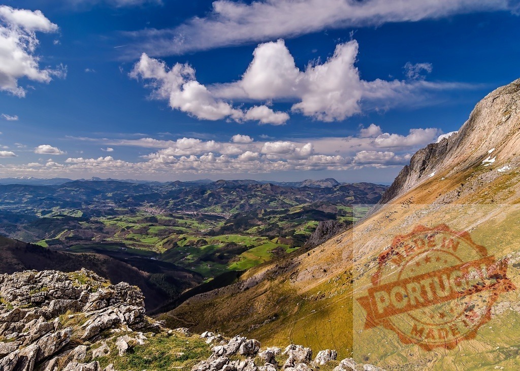 Breathtaking panorama unfolding from Anboto summit in Urkiola Natural Park | Stunning vista encompassing rolling hills, verdant valleys, and the rugged slopes of Anboto mountain under a vibrant sky - Realisiert mit Pictrs.com