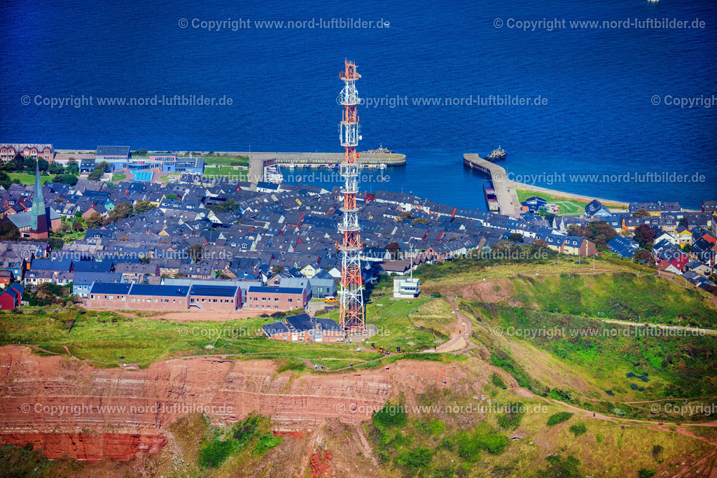 Helgoland_Funkmelde_Turm_Oberland_ELS_4004280824 | HELGOLAND 28.08.2024 Ortsansicht an der Meeres-Küste " Oberland " in Helgoland im Bundesland Schleswig-Holstein, Deutschland. Weiterführende Informationen bei: Helgoland Tourismus-Service. // Townscape on the seacoast " Oberland " in Helgoland in the state Schleswig-Holstein, Germany. Further information at: Helgoland Tourismus-Service. Foto: Martin Elsen