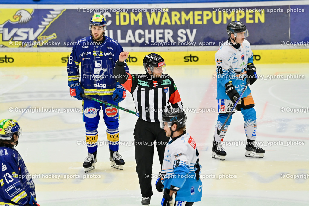 EC IDM WÄRMEPUMPEN VSV vs. Steinbach Black Wings Linz | REZEK GREGOR Referee, #8 Maximilian Rebernig EC VSV, #18 Ken Ograjensek Black Wings Linz, EC IDM WÄRMEPUMPEN VSV vs. Steinbach Black Wings Linz, EC IDM WÄRMEPUMPEN VSV vs. Steinbach Black Wings Linz am 28.11.2025 in Villach (Stadthalle Villach), Austria, (Photo by Bernd Stefan)