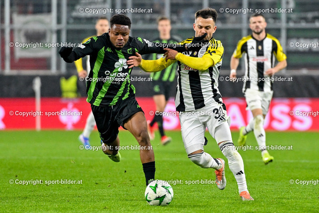 AUT, Fussball UEFA Conference League MD3, LASK (AUT) vs Cercle Brugge KSV (BEL) | 07.11.2024, Oberoesterreich Arena Linz, AUT, UEFA Conference League MD3, LASK (AUT) vs Cercle Brugge KSV (BEL), im Bild Lawrence Agyekum of Cercle Brugge KSV, Sascha Horvath of Lask// UEFA Conference League MD3, LASK Linz (AUT) vs Cercle Brugge KSV (BEL) in Linz, Austria on 2024/11/07