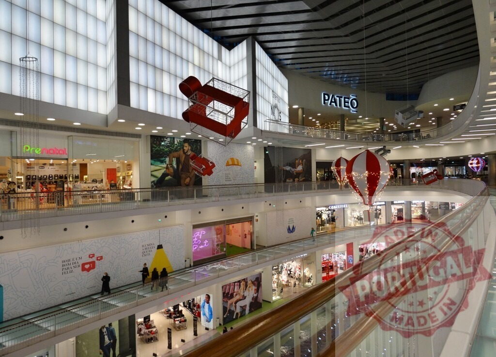 Colombo Shopping Centre interior with modern design | Multilevel indoor shopping mall interior showing stores and architecture - Realized with Pictrs.com
