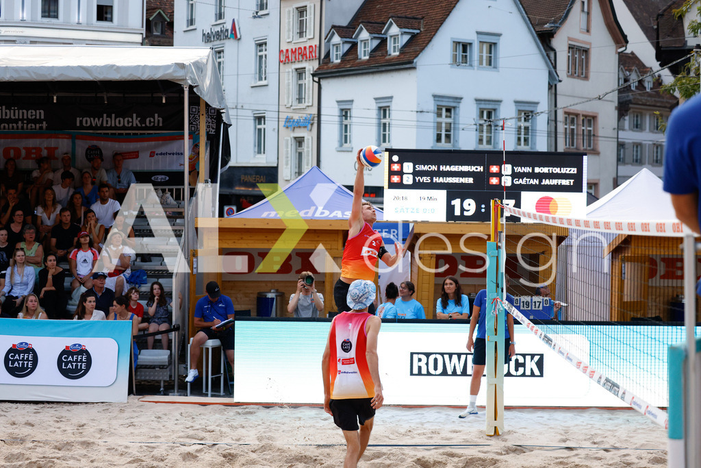 Obi BeachTour 2026 - Basel | BASEL, SWITZERLAND - JULY 17: YVES HAUSSENER (SUI) attack / spike during the Obi BeachTour 2026 match between HAGENBUCH / HAUSSENER (SUI) and BORTOLUZZI / JAUFFRET (SUI) at Barfüsserplatz on July 17, 2026 in Basel, Switzerland. - Realisiert mit Pictrs.com