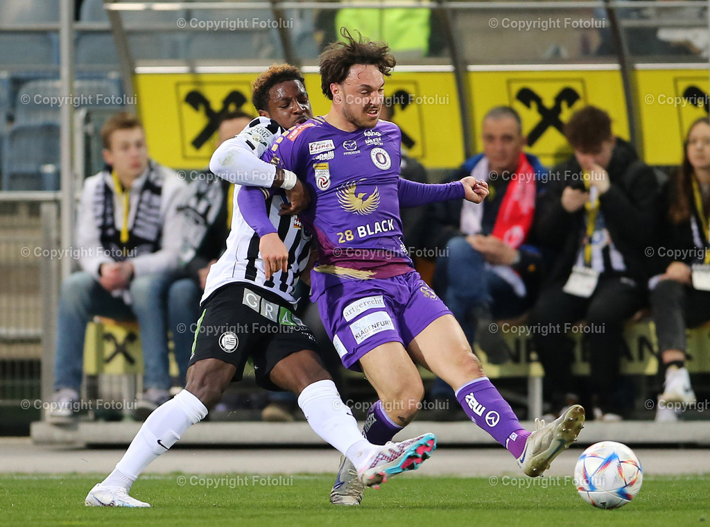 A_LUI_25032023___10 | SPORT,FUSSBALL,ADMIRAL BUNDESLIGA STURM GRAZ-AUSTRIA KLAGENFURT 25.02.2023IM BILD: EMANUEL EMEGHA (GRAZ) UND SIMON STRAUDI (KLAGENFURT) FOTOLUI/MARIO WIMMER