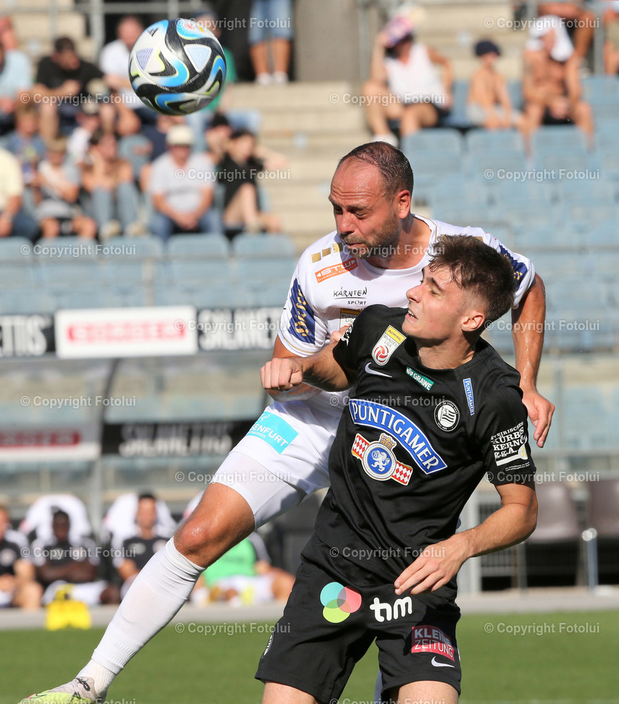 A_LUI_120823_0011 | SPORT,FUSSBALL,ADMIRAL BUNDESLIGA STURM GRAZ-AUSTRIA KLAGENFURT IM BILD:LEON GRGIC (STURM GRAZ) UND RICO BENATELLI (KLAGENFURT) FOTOLUI/MW