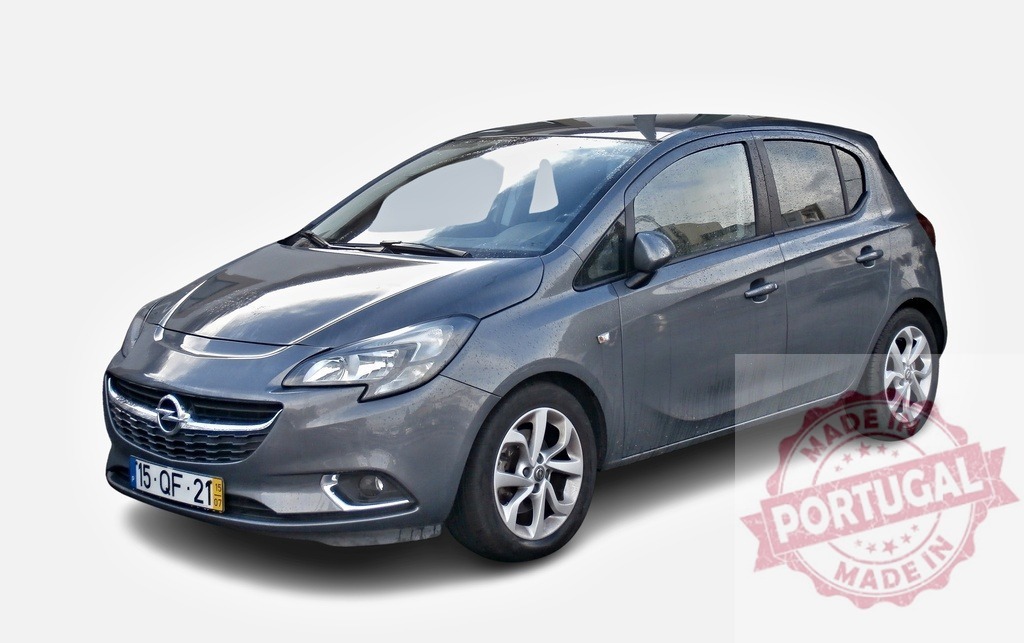 Opel Corsa parked showing front and side view | Modern gray Opel Corsa parked on white background, showing front and side - Realized with Pictrs.com