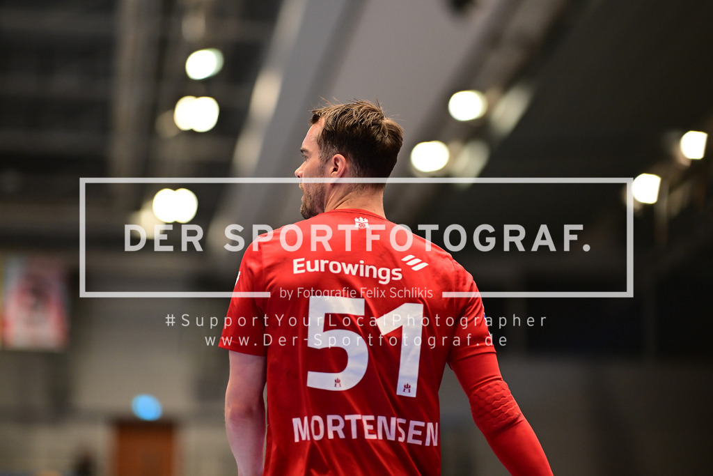 Handball I Herren I Saison 2024-2025 I Bundesliga I 23. Spieltag I HSV Hamburg - MT Melsungen I 26416 | Casper Ulrich Mortensen (51, HSV Hamburg) - Realized with Pictrs.com