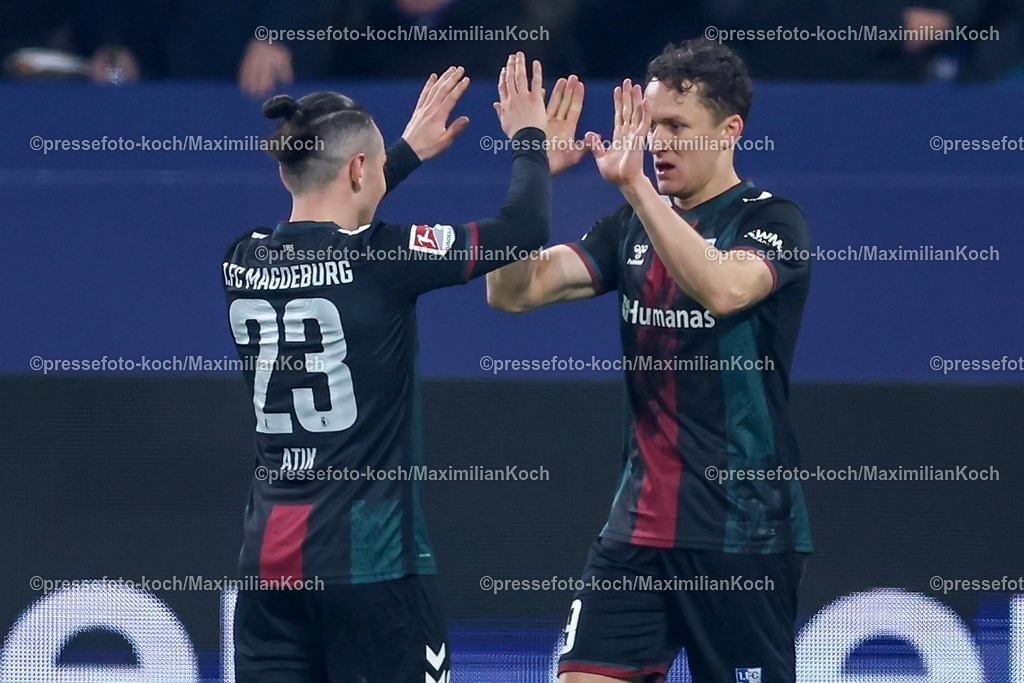 S0401022501080 | 01.02.2025, Fußball, FC Schalke 04 - 1. FC Magdeburg, 2.. Fußball Bundesliga, 20. Spieltag, Veltins-Arena Gelsenkirchen, Saison 2024 2025: Torjubel nach dem 5:1 durch Martijn Kaars (1.FC Magdeburg #9)zusammen mit Baris Atik (1.FC Magdeburg #23)DFB regulations prohibit any use of photographs as image sequences and or quasi-video.