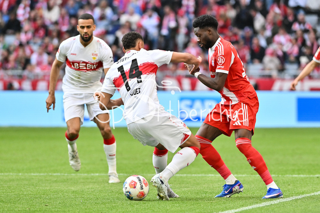FC Bayern München - VfB Stuttgart | MUNICH, GERMANY - 19. APRIL: tackle between Luca Antony JAQUEZ (VfB Stuttgart 14) and Alphonso DAVIES (FC Bayern Munich 19) during the Bundesliga Match between FC Bayern Munich vs. VfB Stuttgart at Matchday 30 at Allianz Arena / DFL REGULATIONS PROHIBIT ANY USE OF PHOTOGRAPHS AS IMAGE SEQUENCES AND/OR QUASI-VIDEO