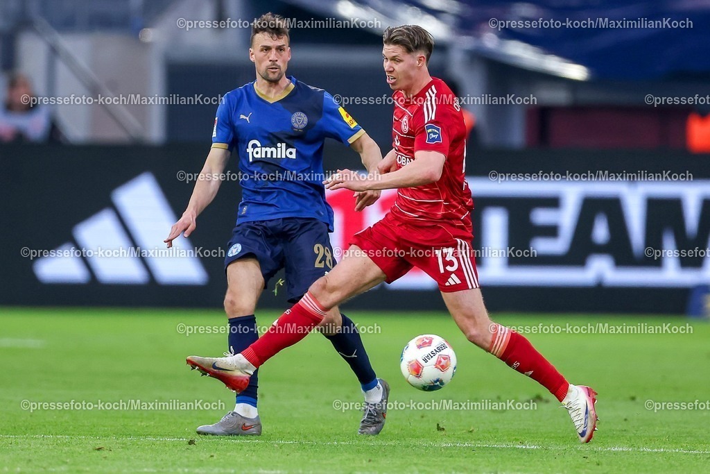 F9510042601073 | 10.04.2026, Fußball, Fortuna Düsseldorf - Holstein Kiel, 2. Fußball Bundesliga, Herren, Merkur Spiel-Arena, 29. Spieltag, Saison 2025 2026: Jonas Meffert&nbsp; (Holstein Kiel #28) im Zweikampf gegen  Cedric Itten&nbsp;(Fortuna Düsseldorf #13)  DFB regulations prohibit any use of photographs as image sequences and or quasi-video.